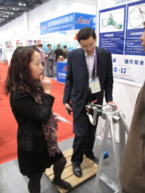 Asia Pacific Natural Gas Vehicles Association attendees viewing Macro LNG Nozzle connection